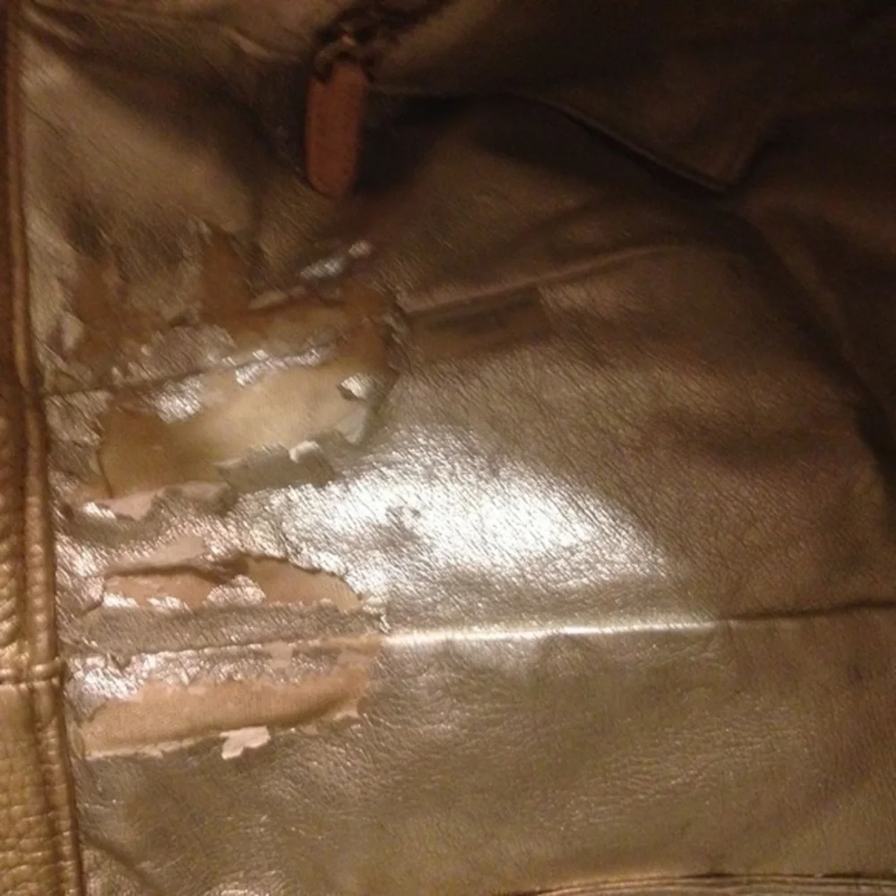 Michael Kors gold metallic leather bag